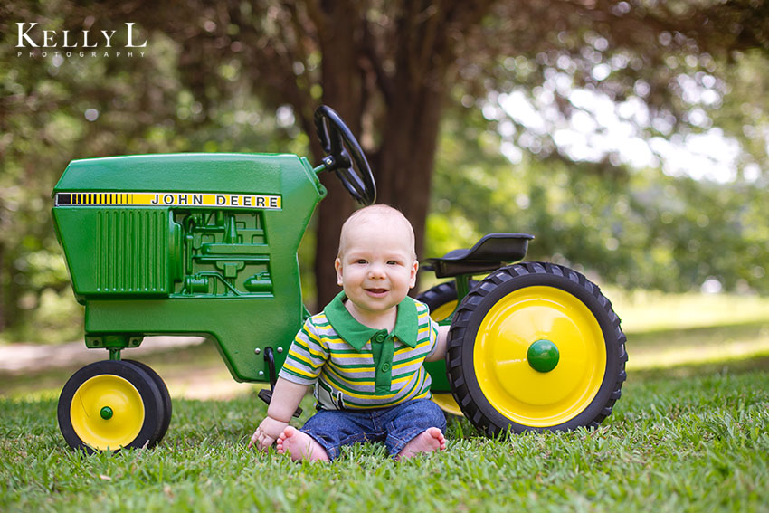 6 month baby portrait with tractor