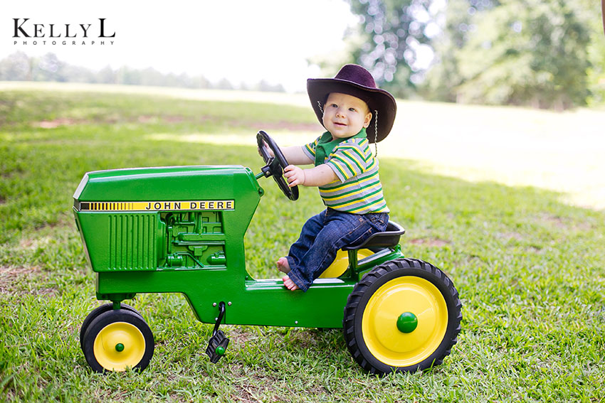 baby riding tractor