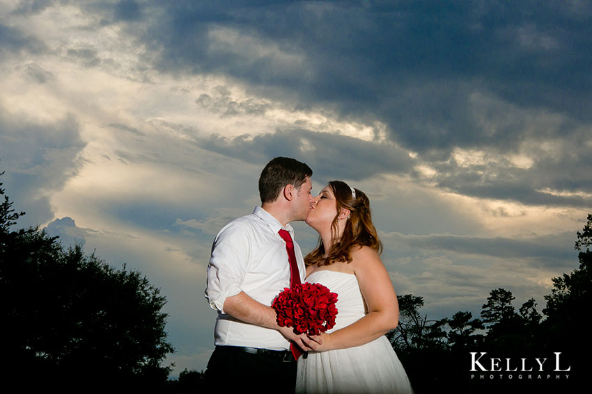 bride and groom as sun is setting