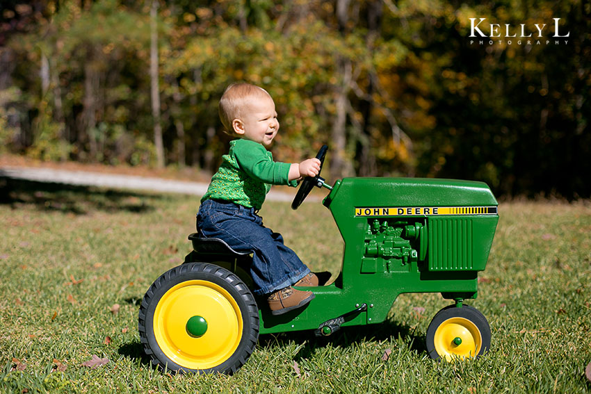 baby on tractor
