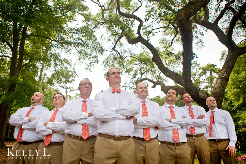 photo of groomsmen with coral ties