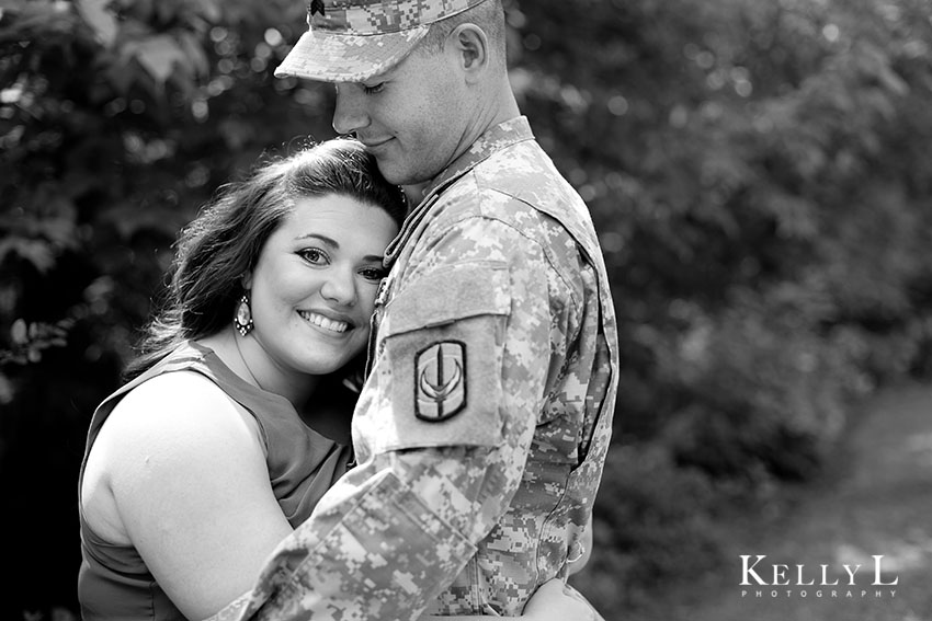 sweet engagement photo with military uniform