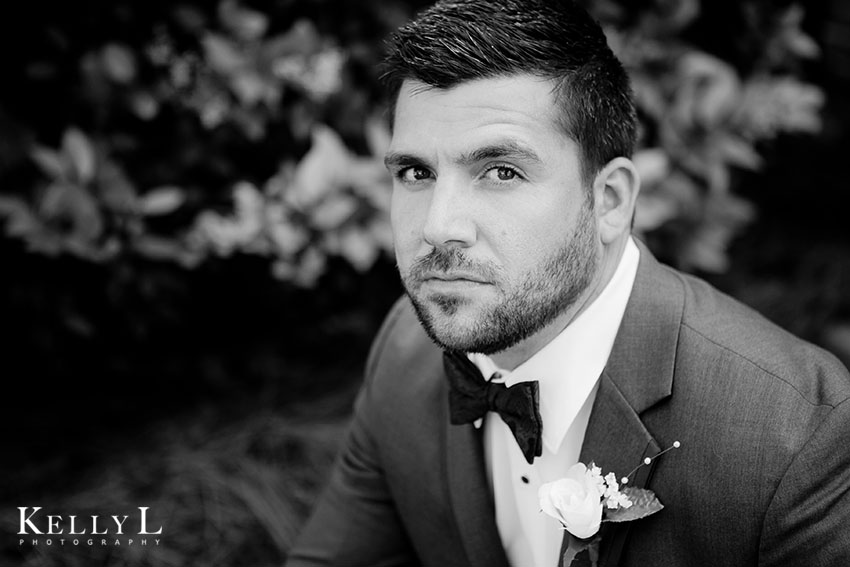 black and white portrait of groom