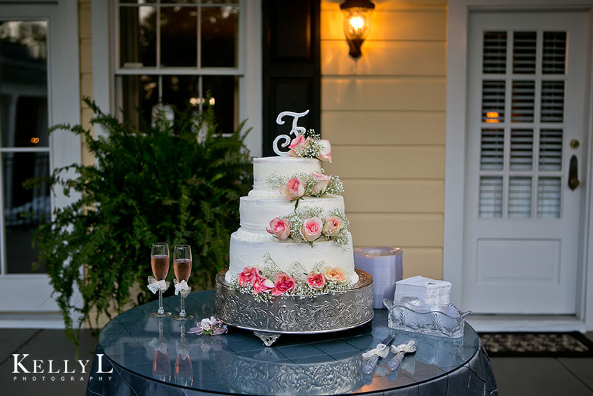 beautiful wedding cake decorated with pink flowers