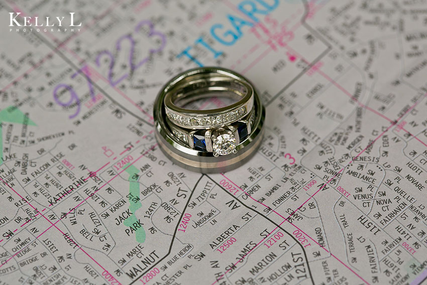 engagement and wedding rings on map