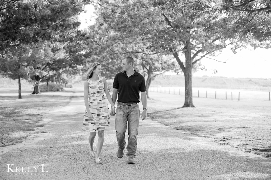 couple walking in black and white