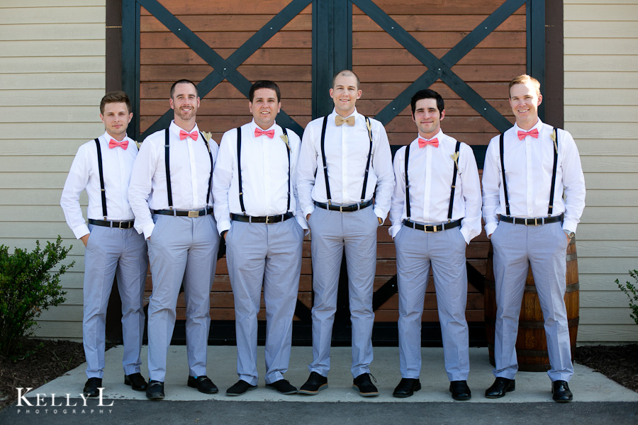 groomsmen wearing gray and suspenders