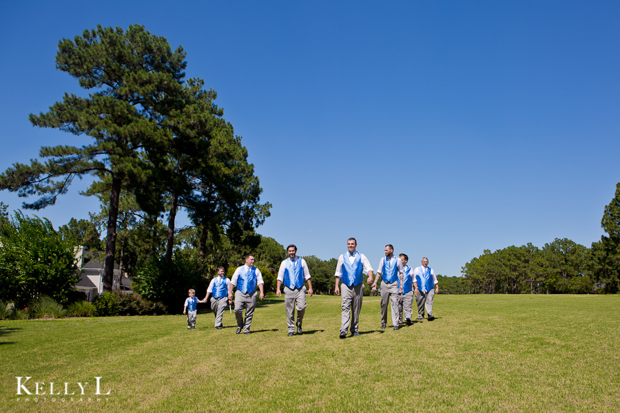 groomsmen walking on golf course