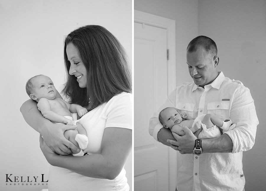 portraits of mom and dad with new baby