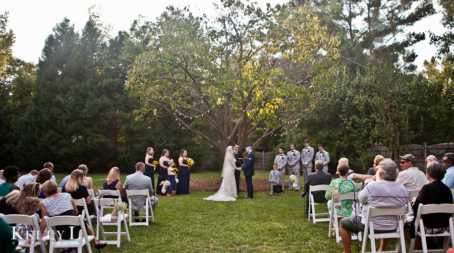 wintergreen woods wedding in front of tree