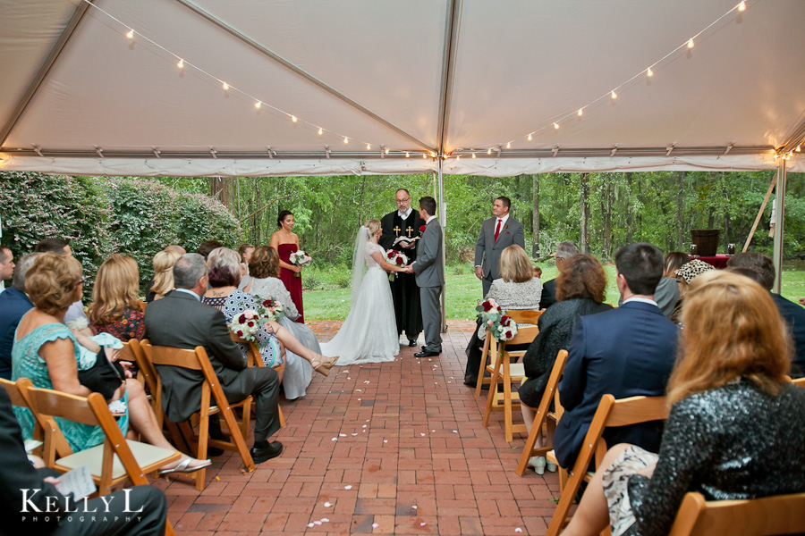 outdoor wedding ceremony in a tent