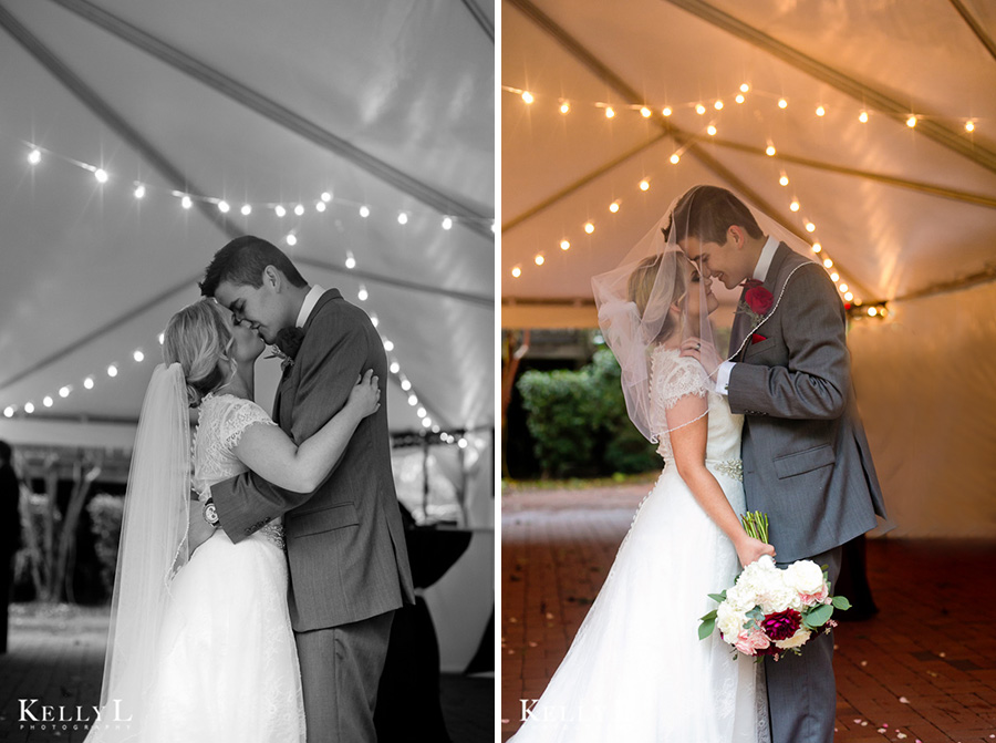 bride and groom in a tent with string lights