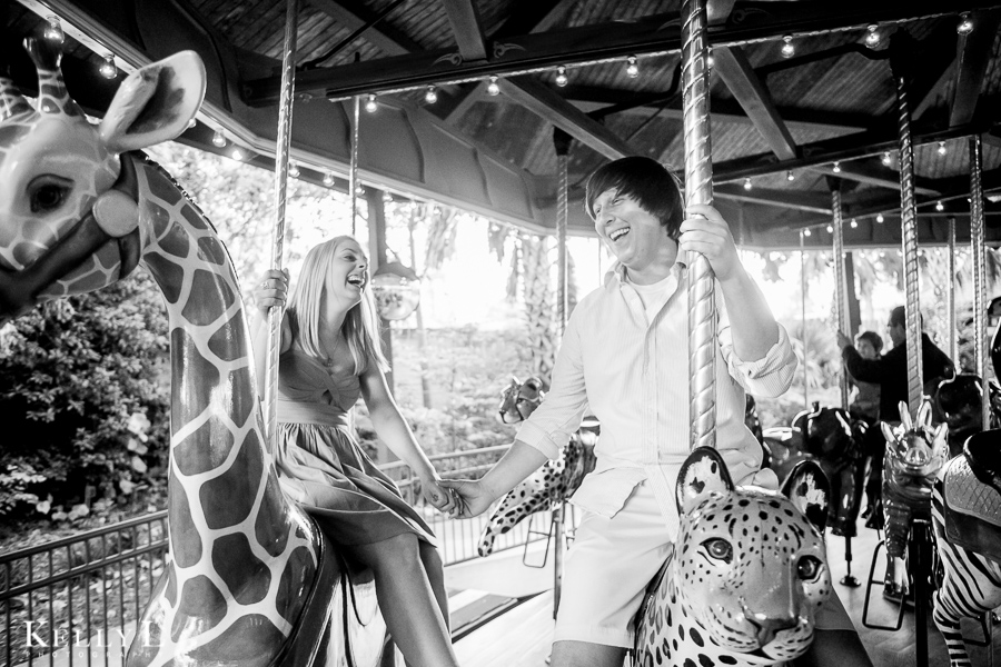 fun couple portraits on a carousel 